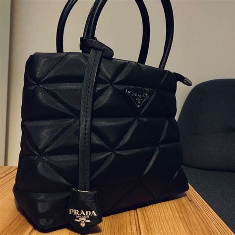 biala torebka prada|prada torebek.